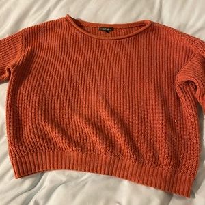 A cropped sweater